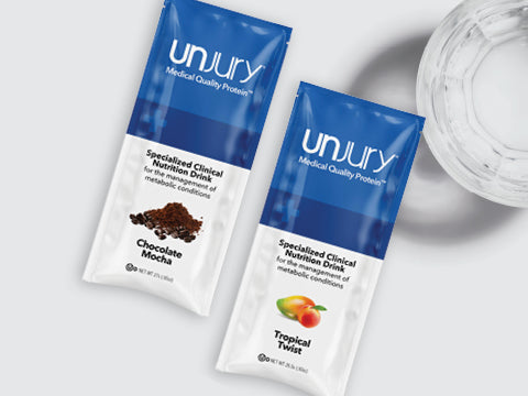 Unjury Protect & Restore Advanced Protein Single Serve Packets with a glass of water.